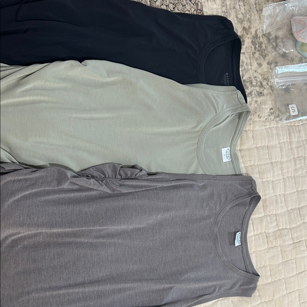 Athleta set of Three With Ease Cunch Sleeveless Tops in soft colors